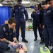 U.S. Navy Sailors conduct CPR Training evolution.