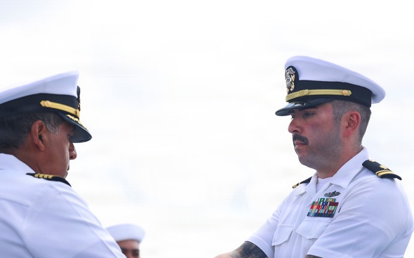 USS Bataan (LHD 5) Raises 81-Year-Old American Flag