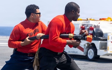 U.S. Navy Sailors conduct routine hose testing during Acceptance Trials