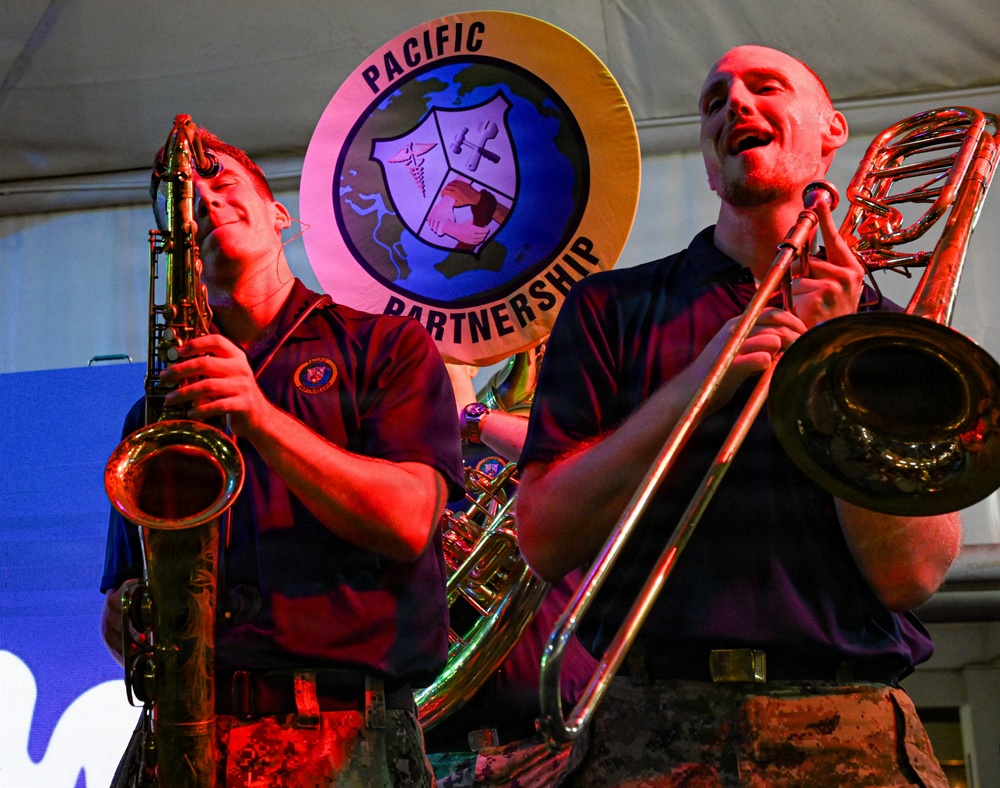 Pacific Partnership Band performs at Timor Plaza Night Market in Dili, Timor-Leste