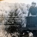 A museum or exhibit display panel featuring a black-and-white historical photograph of a soldier operating what appears to be a military vehicle. Overlaid on the image is a quote attributed to Sergeant Bud Lewis of the Service Company, 186th Infantry Regiment. The quote reads: 'You could not speak of the company without speaking of the city where those men came from.'
