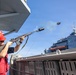 USS Mustin conducts a replenishment-at-sea with USNS Wally Schirra