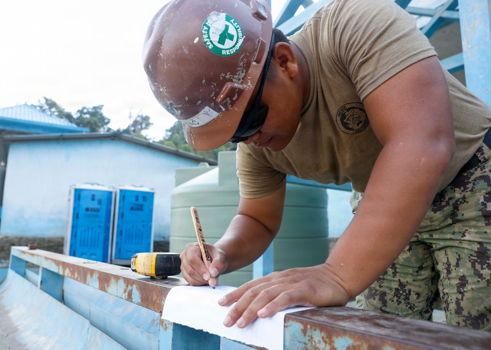 U.S. Navy Seabees break ground at Escola Básica Filial Kasnafar engineering site during Pacific Partnership 2026 in Dili, Timor-Leste