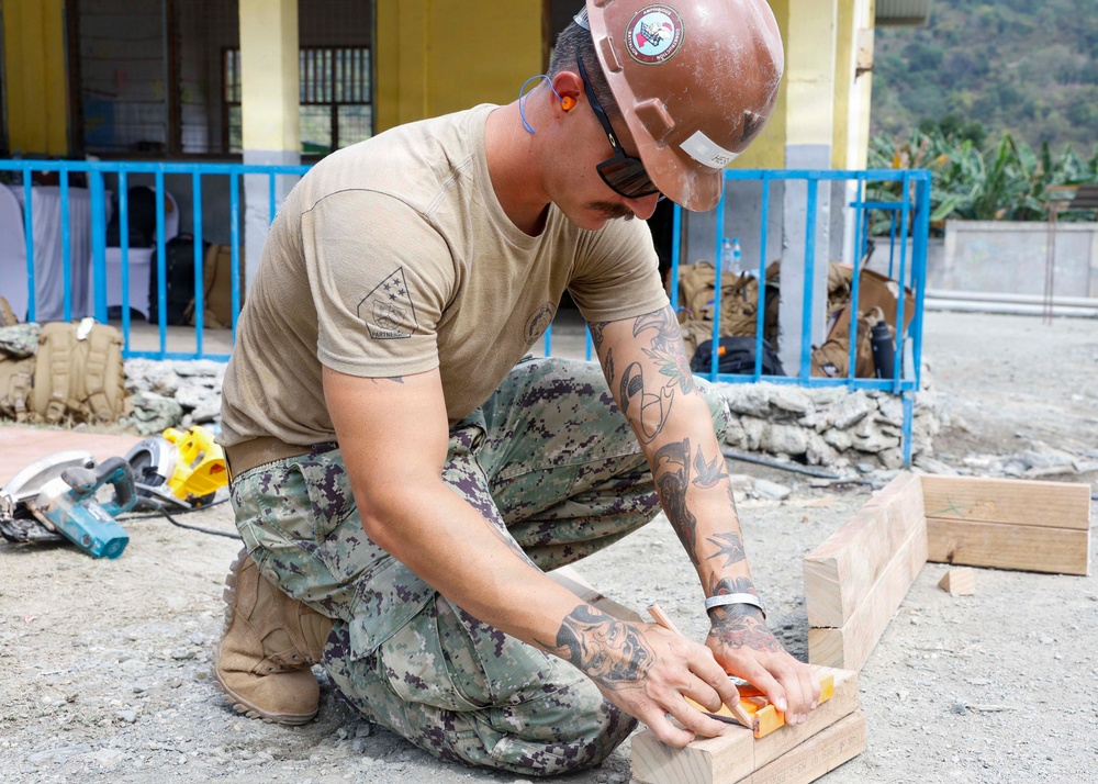 U.S. Navy Seabees break ground at Escola Básica Filial Kasnafar engineering site during Pacific Partnership 2026 in Dili, Timor-Leste