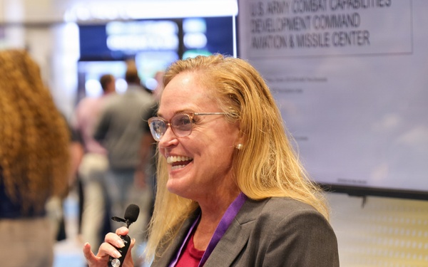 Christi Dolbeer Speaks at SMD Symposium in DEVCOM AvMC Booth
