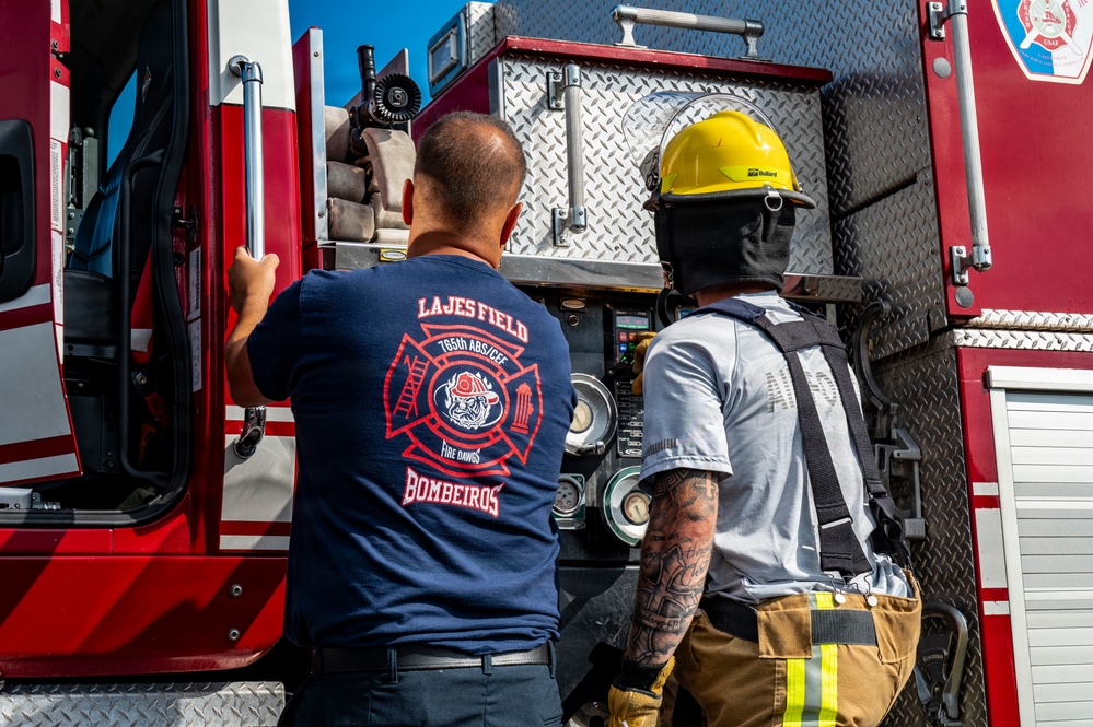 121 ARW and Lajes firefighters clean KC-46