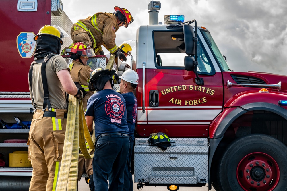 121 ARW and Lajes firefighters clean KC-46