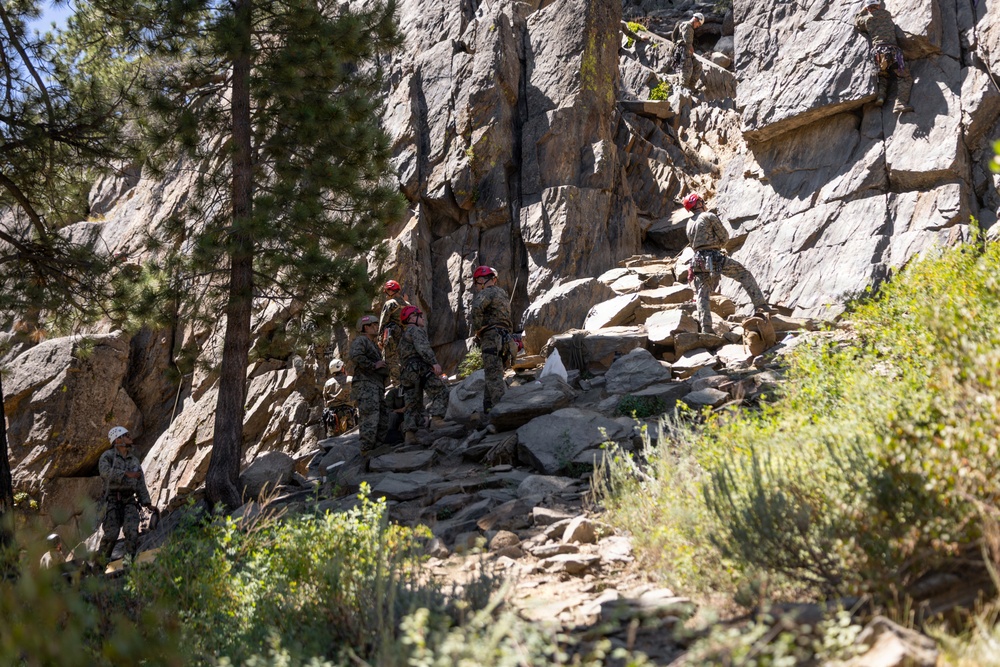 Summer Mountain Leaders Course 1-26 students test their repelling skill on Little Face