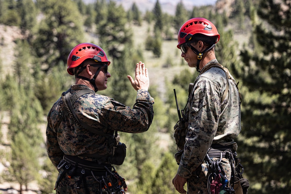 Summer Mountain Leaders Course 1-26 students test their repelling skill on Little Face