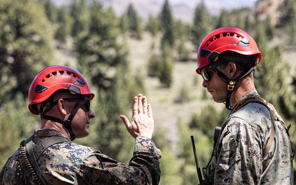Summer Mountain Leaders Course 1-26 students test their repelling skill on Little Face