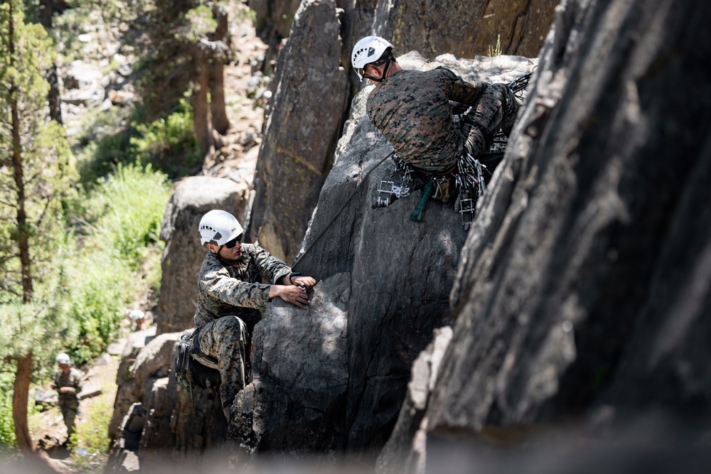 Summer Mountain Leaders Course 1-26 students test their repelling skill on Little Face