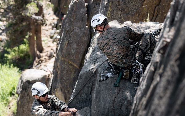 Summer Mountain Leaders Course 1-26 students test their repelling skill on Little Face