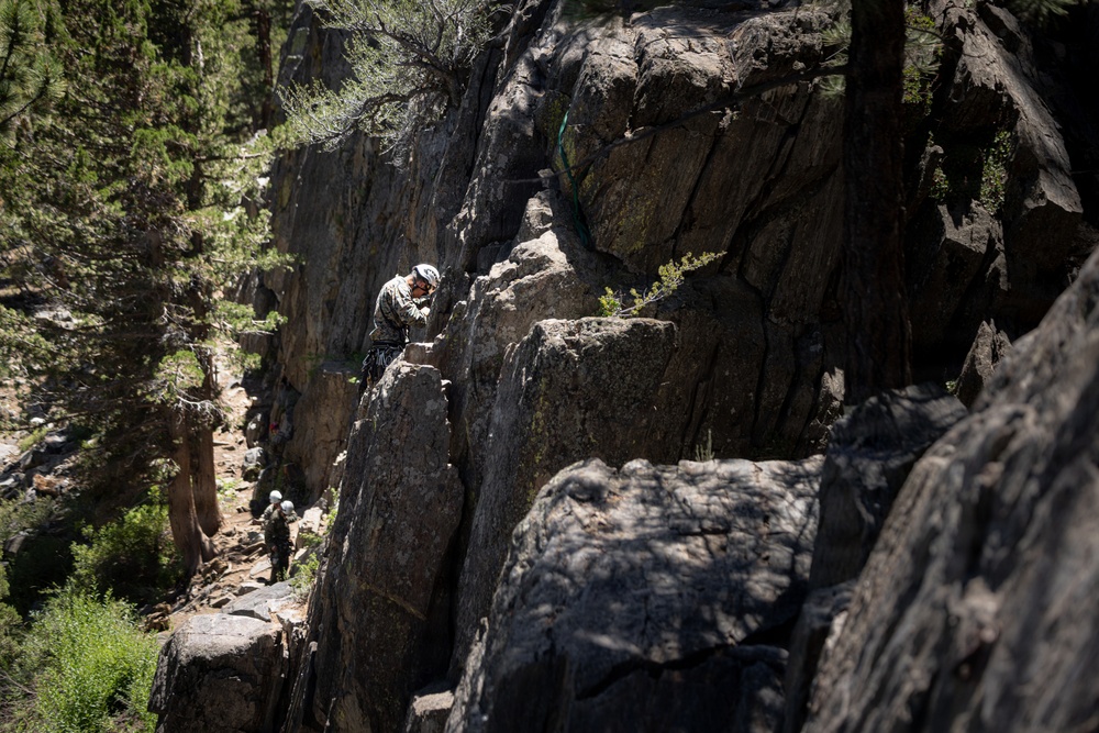 Summer Mountain Leaders Course 1-26 students test their repelling skill on Little Face