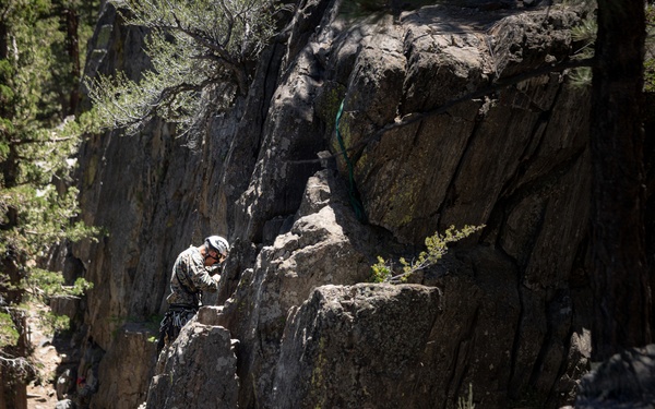 Summer Mountain Leaders Course 1-26 students test their repelling skill on Little Face