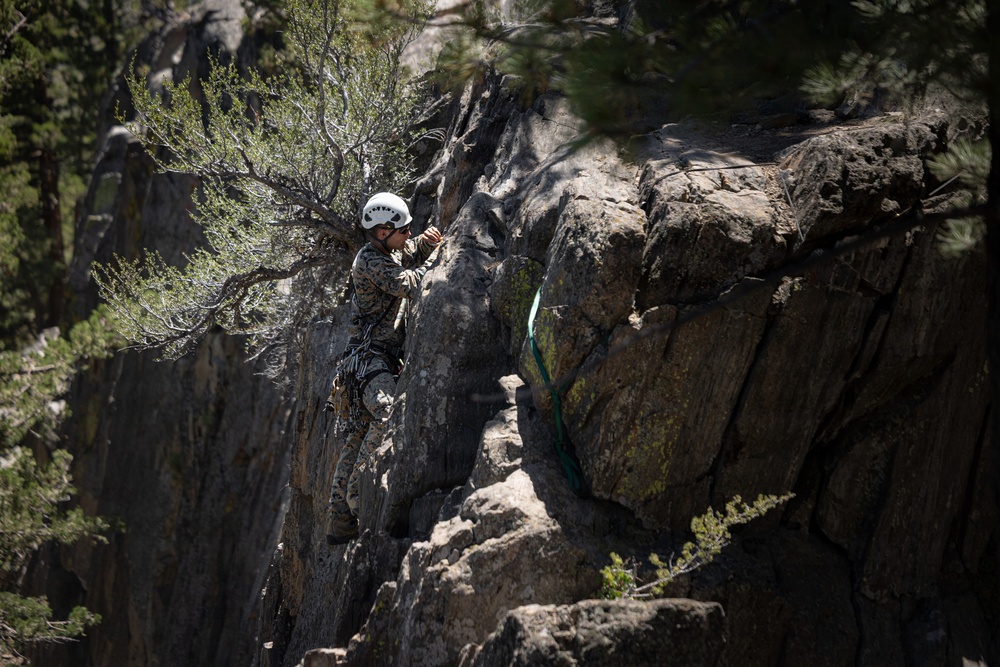 Summer Mountain Leaders Course 1-26 students test their repelling skill on Little Face