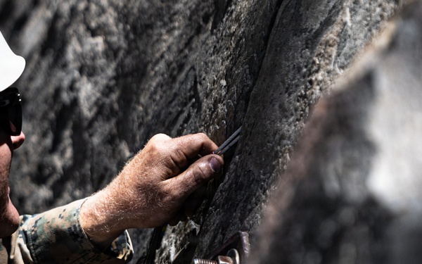Summer Mountain Leaders Course 1-26 students test their repelling skill on Little Face