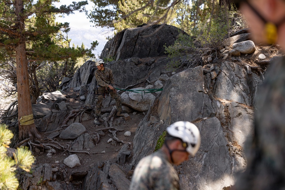 Summer Mountain Leaders Course 1-26 students test their repelling skill on Little Face