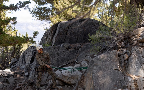 Summer Mountain Leaders Course 1-26 students test their repelling skill on Little Face