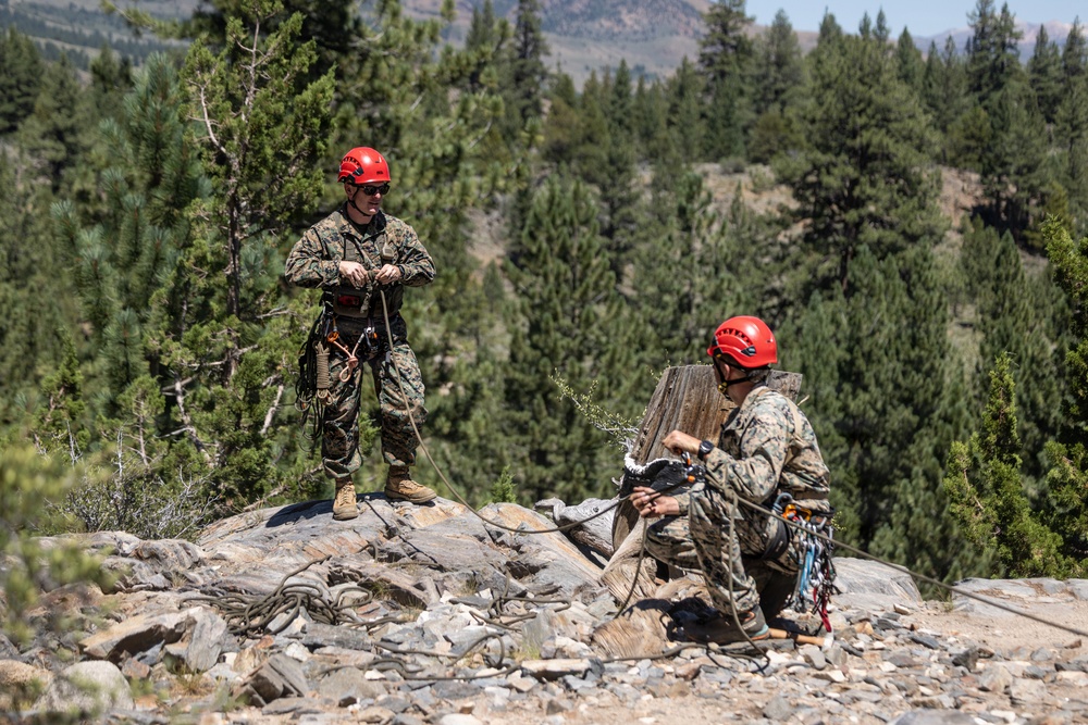 Summer Mountain Leaders Course 1-26 students test their repelling skill on Little Face