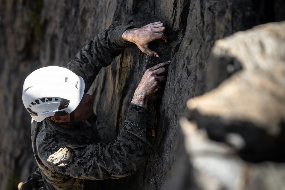 Summer Mountain Leaders Course 1-26 students test their repelling skill on Little Face