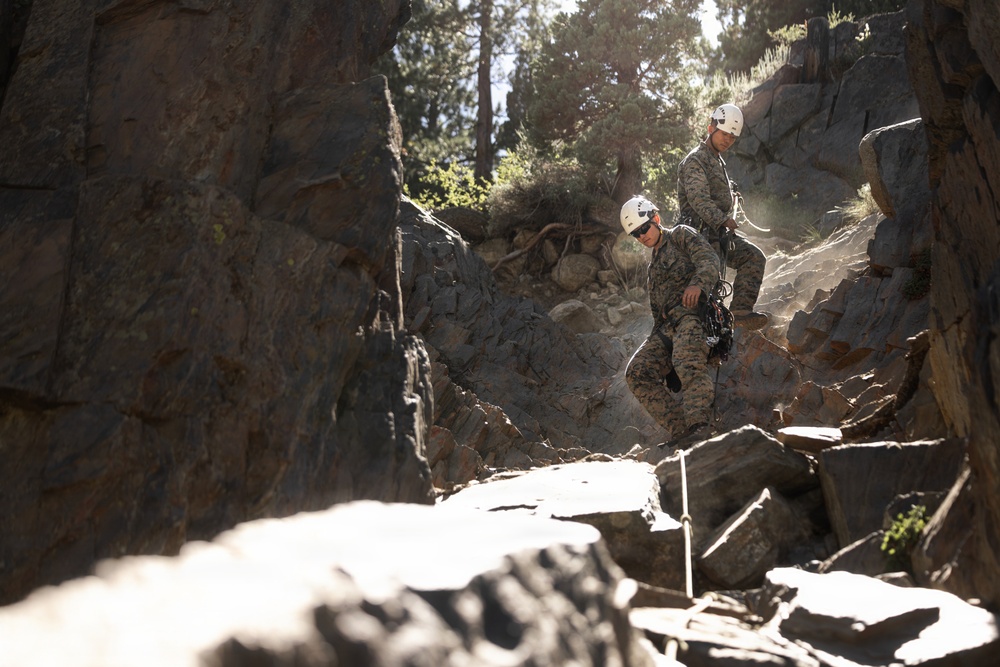 Summer Mountain Leaders Course 1-26 students test their repelling skill on Little Face