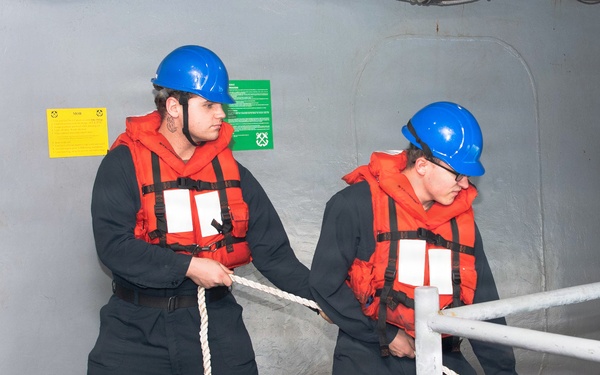 Ronald Reagan Sailors Perform a Rigid Hull Inflatable Boat Onload
