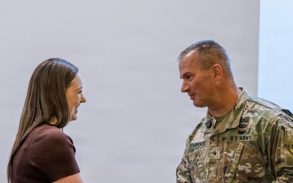 USAG Wiesbaden personnel recognized with coins by Senior Responsible Officer during CI2 Seminar