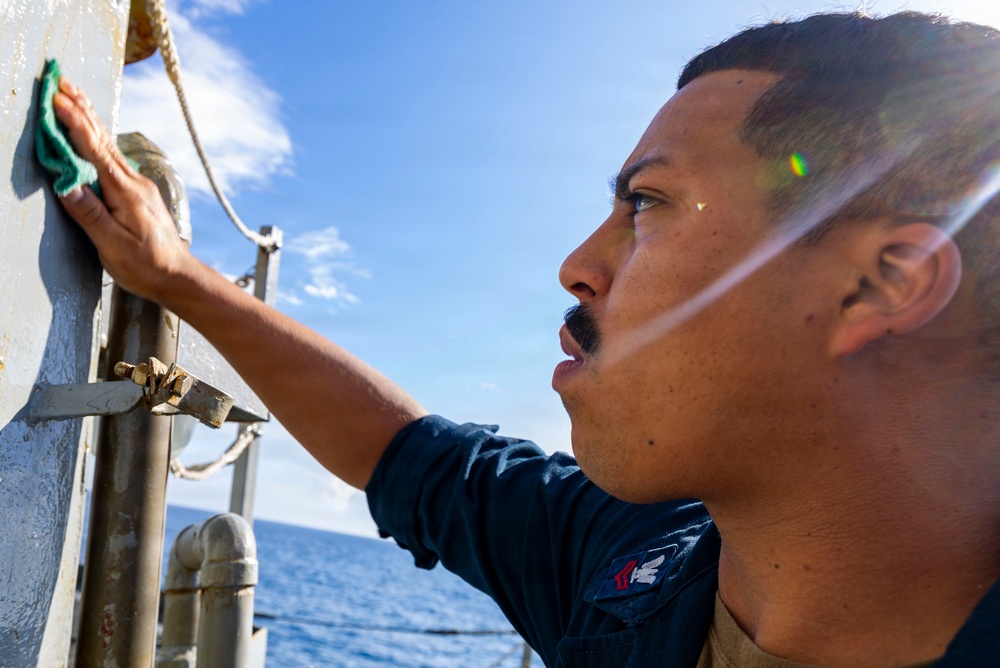 USS Benfold Conducts A Freshwater Washdown