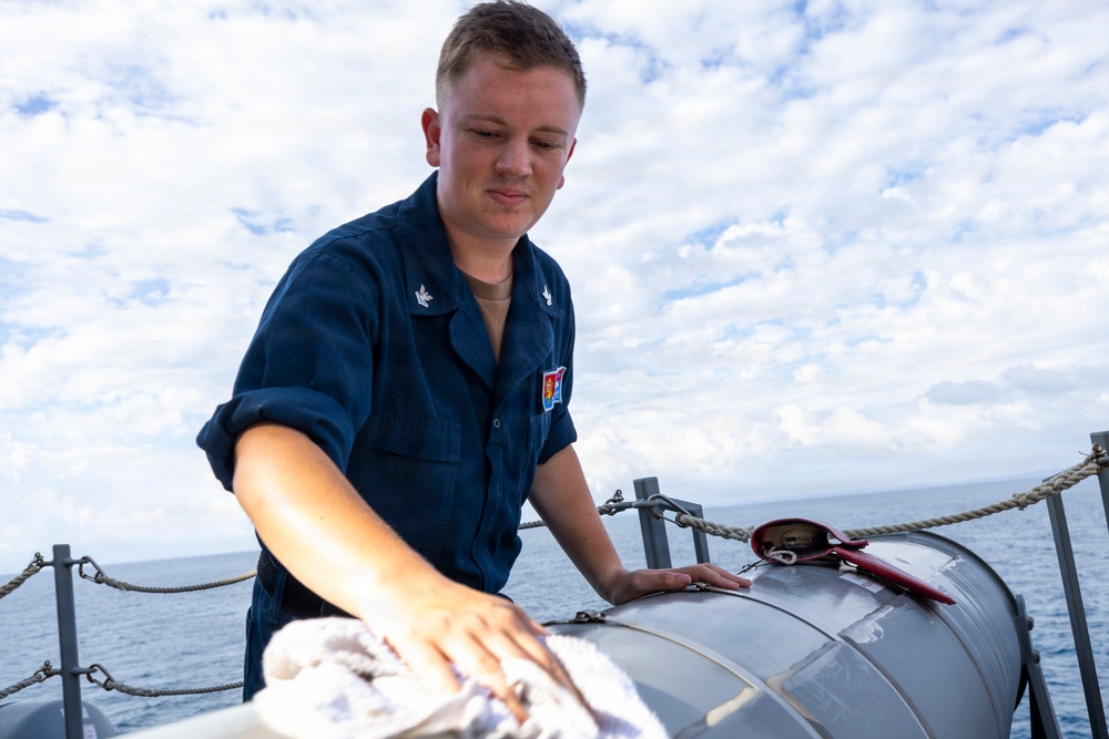 USS Benfold Conducts A Freshwater Washdown