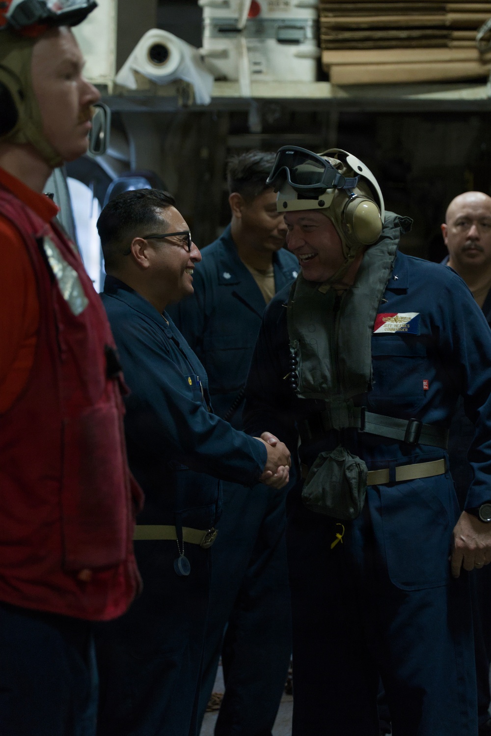 CTF70 Shakes USS Robert Smalls' (CG 62) Hand Prior to Departing