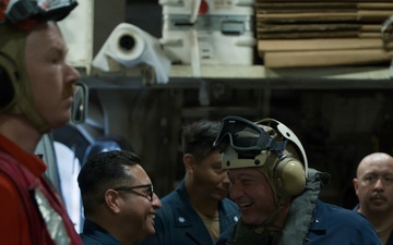 CTF70 Shakes USS Robert Smalls' (CG 62) Hand Prior to Departing