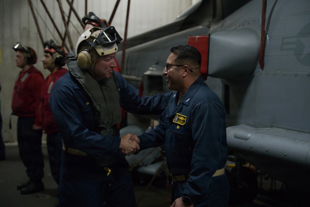 Rear Admiral Heames Shakes Hands with Captain Garza