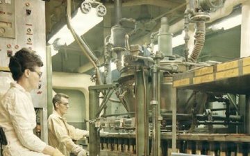 Workers Monitor Industrial Munitions Production Line at Crane Army Ammunition Activity, circa 1960s-1970s