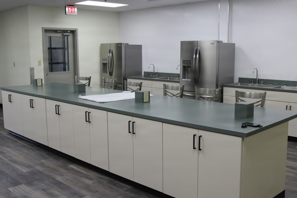 Psychological Operations Soldiers partner with Fort Bragg Directorate of Public Works to install barracks community kitchen
