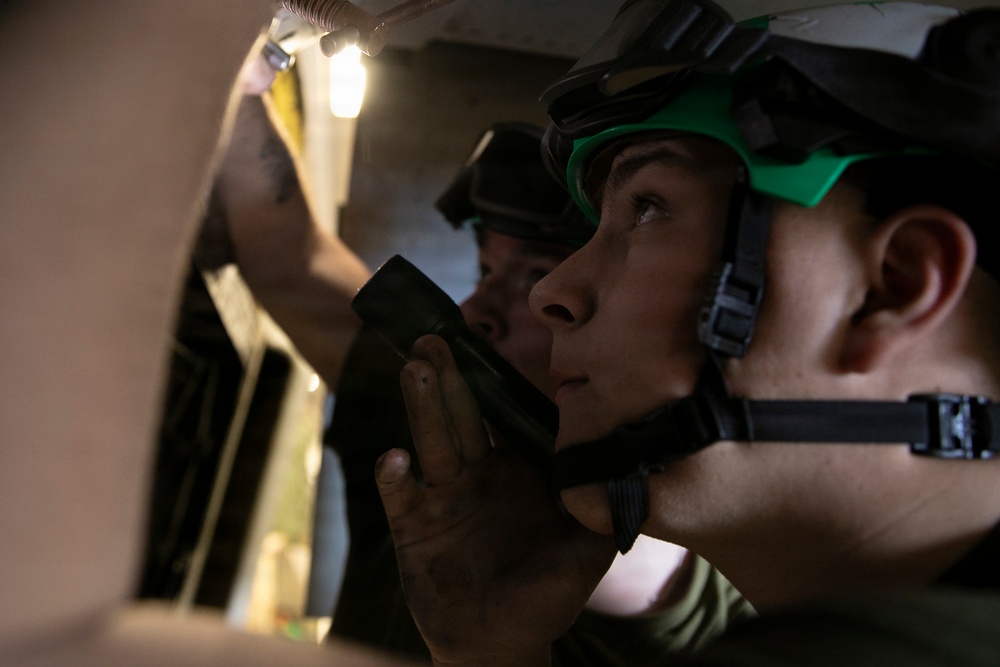 U.S. Marines Conduct Corrective Maintenance on MV-22B Osprey