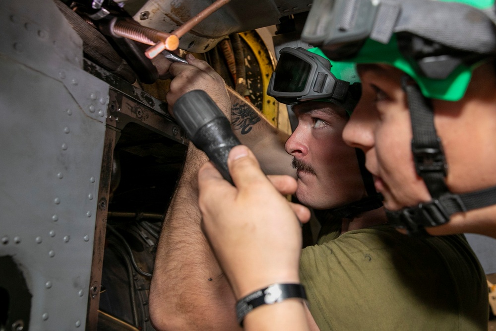 U.S. Marines Conduct Corrective Maintenance on MV-22B Osprey