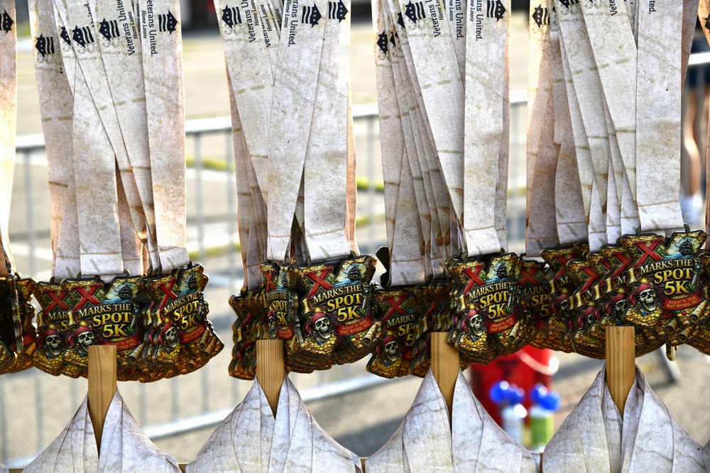 Soldiers, families don pirate gear to run final leg of summer 5K race series