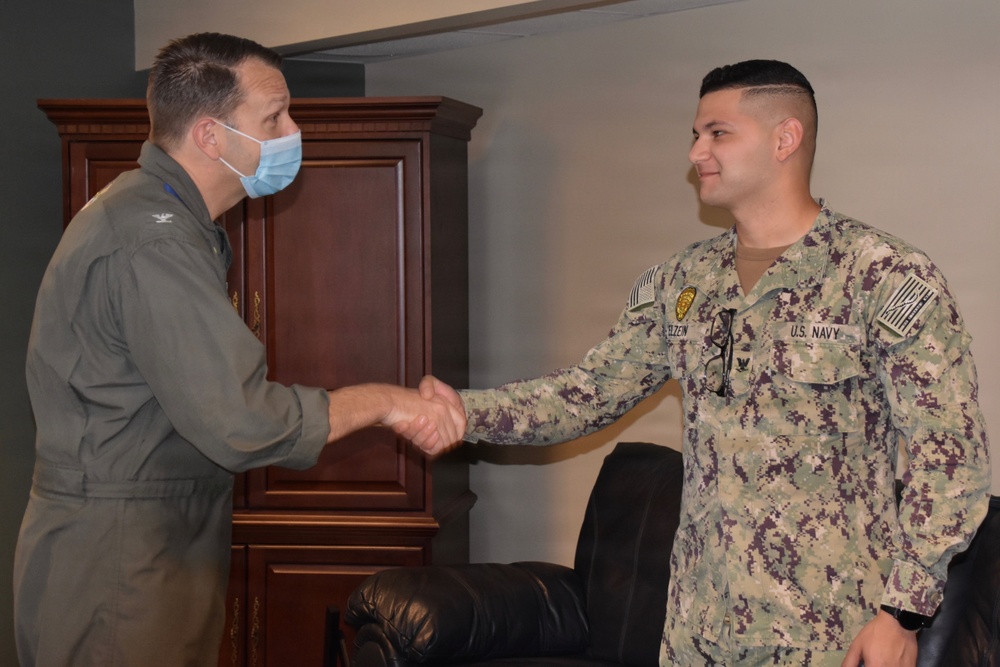 NAS Jacksonville Commanding Officer surprised Sailors today by promoting them through the Meritorious Advancement Program
