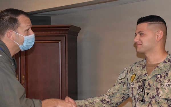 NAS Jacksonville Commanding Officer surprised Sailors today by promoting them through the Meritorious Advancement Program