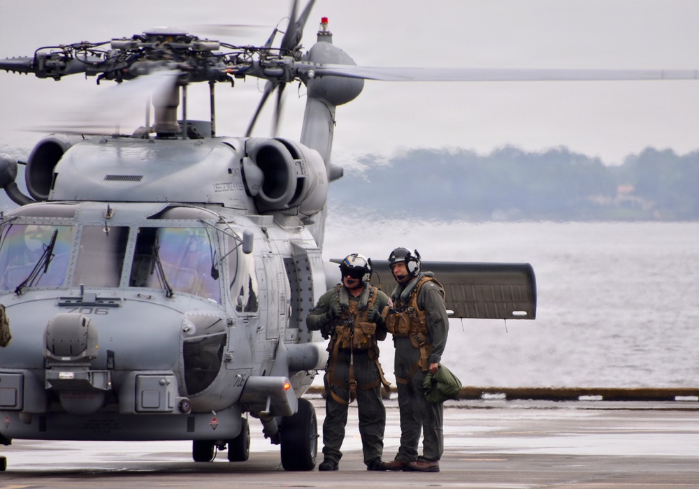 NAS Jacksonville Commanding Officer Capt. Brian Weiss flew his last flights in the MH-60R and the P-3C Orion