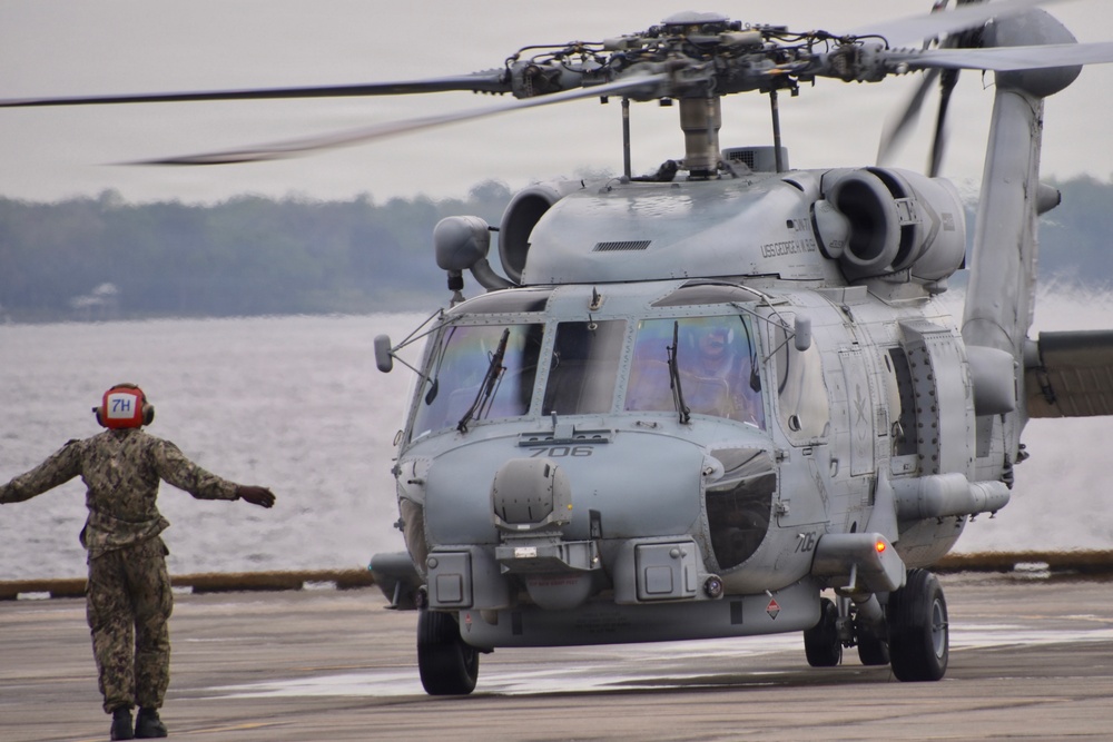 NAS Jacksonville Commanding Officer Capt. Brian Weiss flew his last flights in the MH-60R and the P-3C Orion