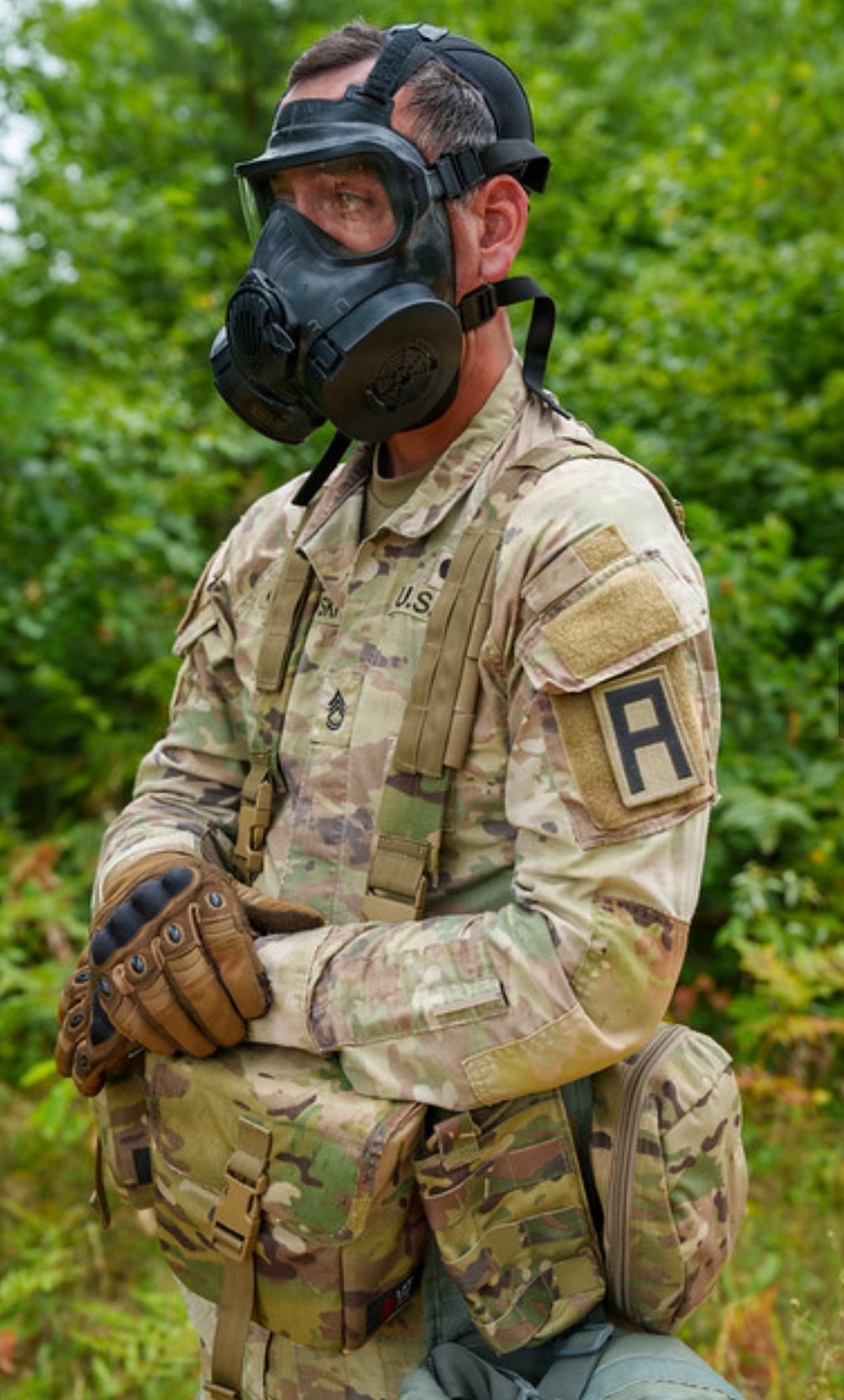 OC/T Demosntrates Correct Use of Gas Mask