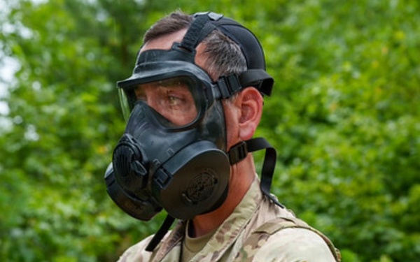 OC/T Demosntrates Correct Use of Gas Mask