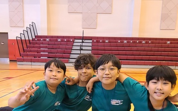 Korean and American Youth Participants Pose During the 2026 PIEFriends Summer Camp. at Camp Humphreys Gymnasium