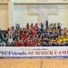 PIEFriends Summer Camp group photo at Camp Humphreys gymnasium, South Korea, 2026