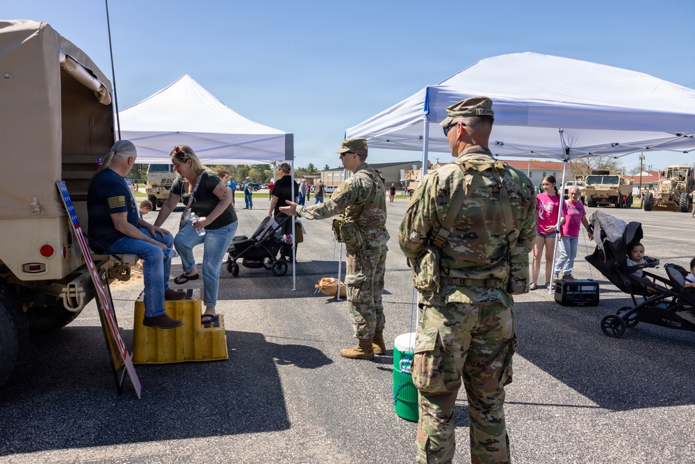 Soldiers Take Photos at Humvee