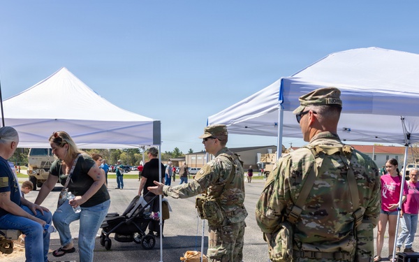 Soldiers Take Photos at Humvee
