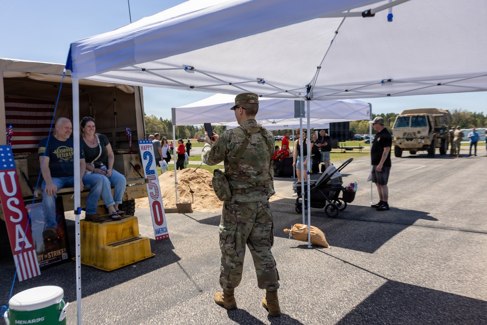 Soldiers Take Photos at Humvee