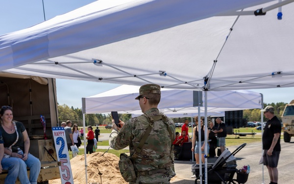 Soldiers Take Photos at Humvee