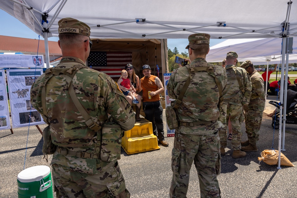 Soldiers Take Photos at Humvee